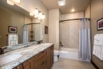 Spacious bathroom with granite counter tops